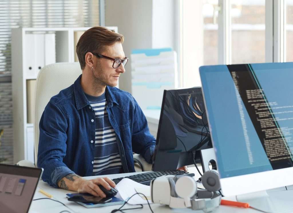 IT MSP Working At Desk